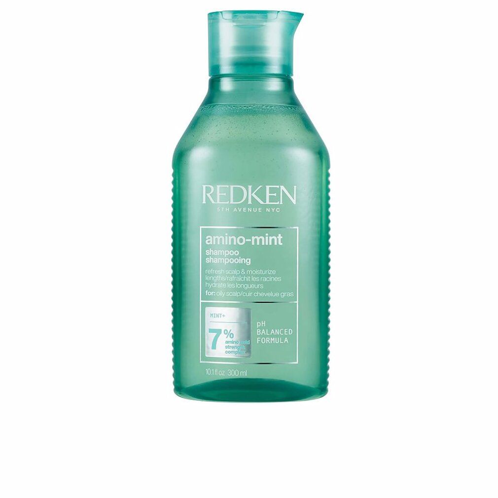 Flacone verde di shampoo Redken Amino Mint. Testo: Shampoo, formula pH bilanciata, 7%.