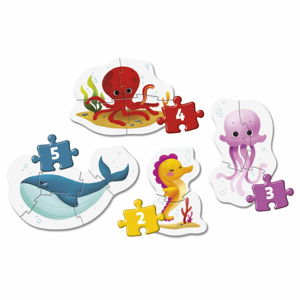 Quattro puzzle di animali marini. Ogni puzzle è composto da più pezzi. Soggetti: polpo, balena, cavalluccio marino, medusa.