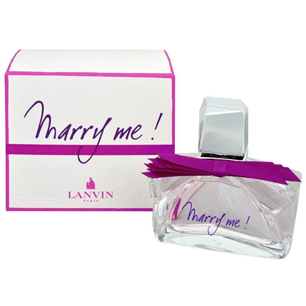 Flacone di profumo e confezione. Flacone con fiocco e scritta "Marry me!". Confezione con scritta "Marry me!" e logo.