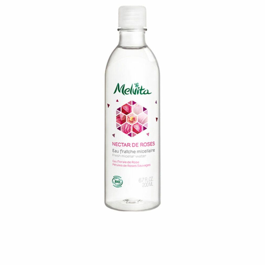 Flacone trasparente con tappo bianco. Etichetta con logo, nome del prodotto e marchio bio. Testo: Nectar de Roses, Eau fraiche micellaire.