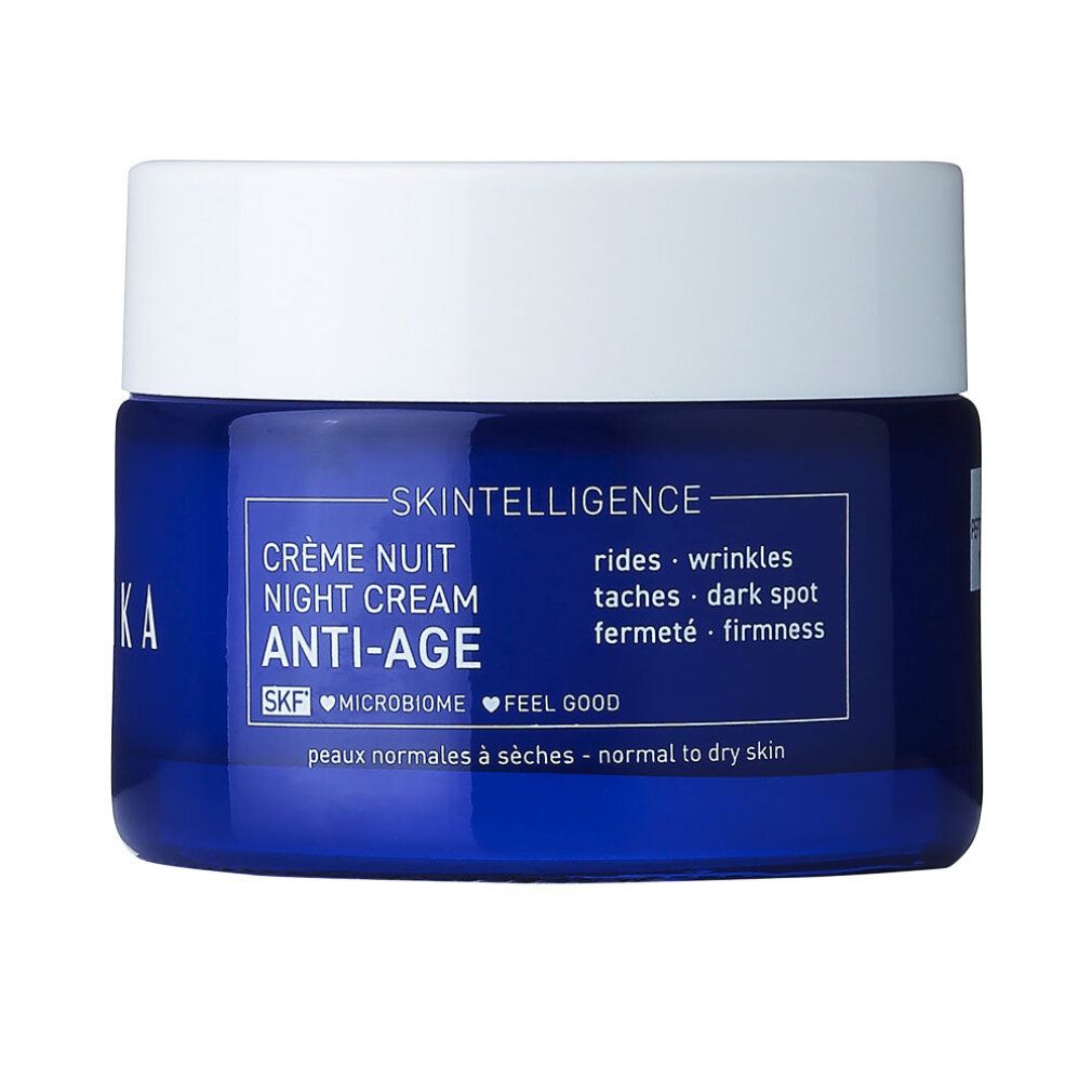 Vasetto blu con coperchio bianco. Scritta: Skintelligence, Crème Nuit Night Cream Anti-Age. Per pelli normali e secche. Contiene SKF, Microbiome, Feel Good.