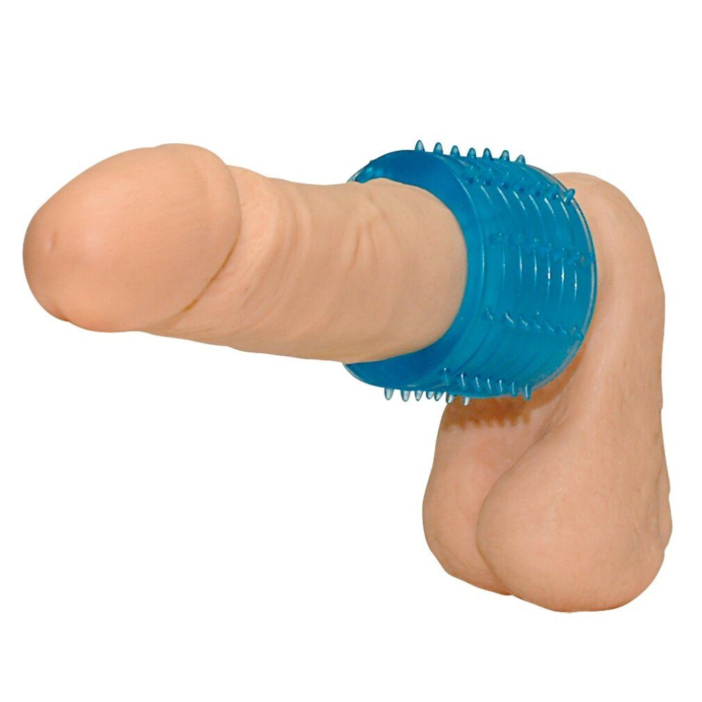 Prodotto cilindrico blu con nodi, posto su un pene. Materiale: plastica. Forma: cilindrica. Superficie con punte.