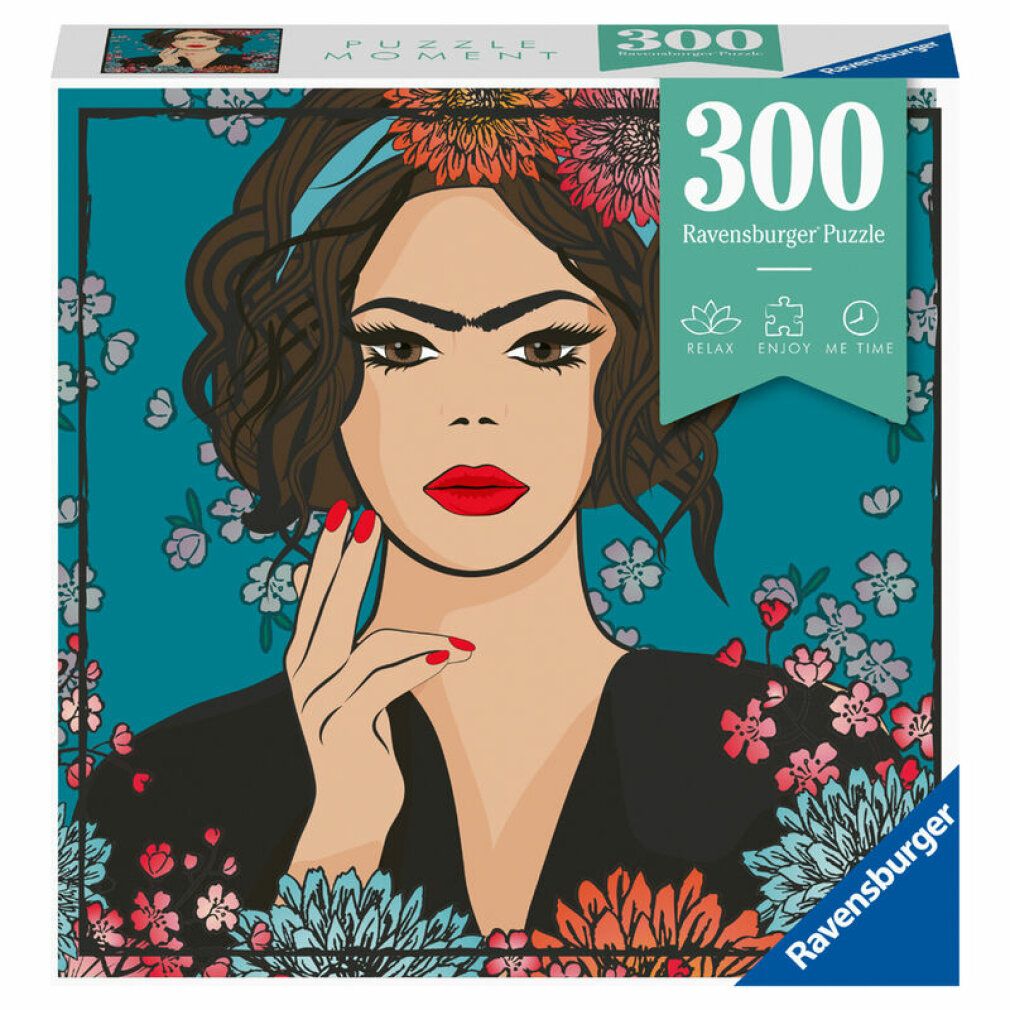 Scatola puzzle con illustrazione di Frida Kahlo. 300 pezzi, marchio Ravensburger. Donna con corona di fiori e rossetto rosso.