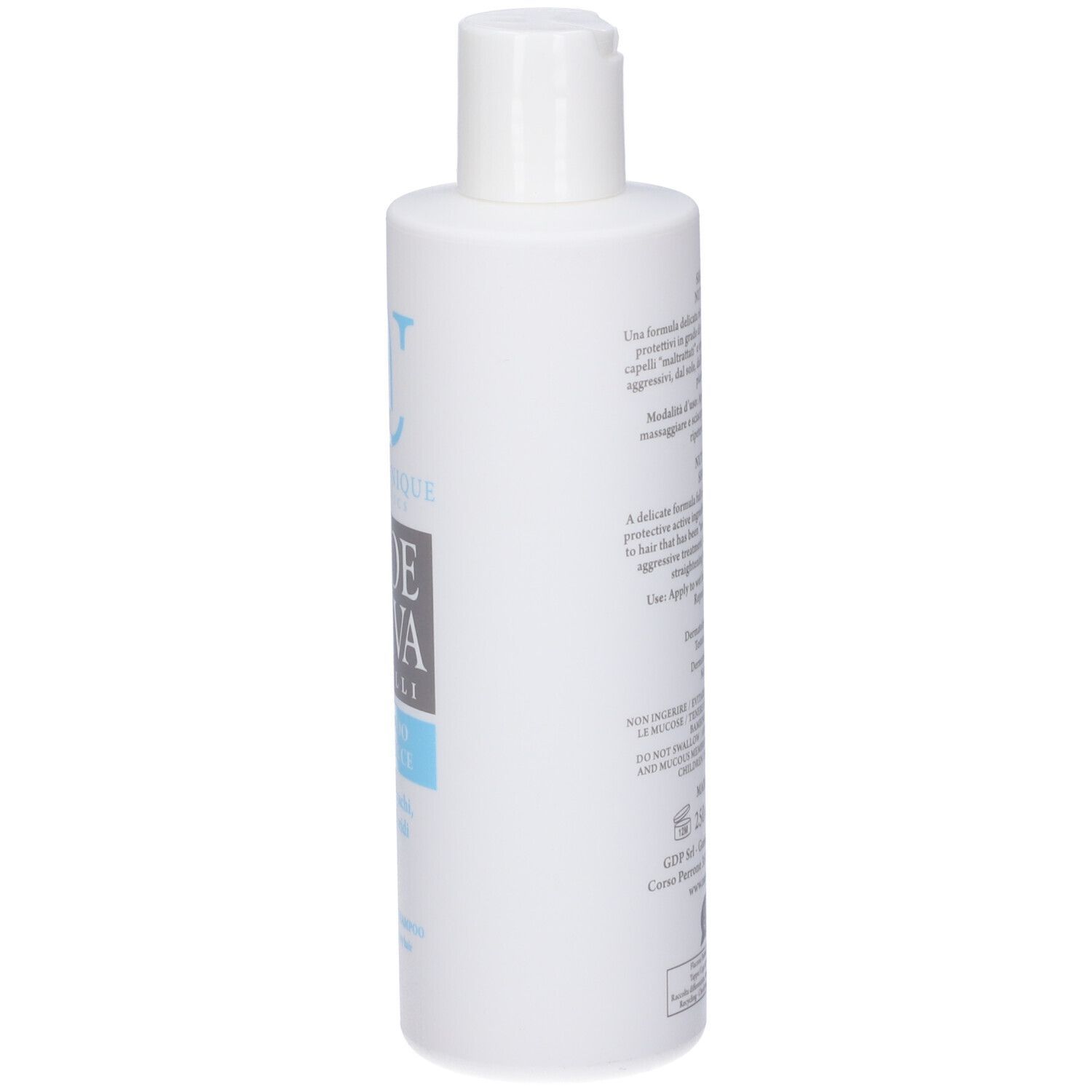 Flacone bianco con testo. Scritta: Natur Unique, Aloe Attiva, Shampoo Nutriluce. Per capelli secchi. Testo in italiano.