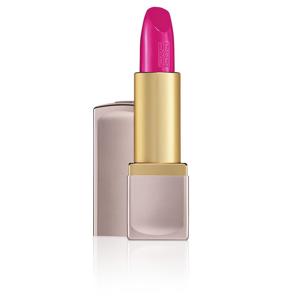 Rossetto rosa acceso con astuccio dorato e rosa. Il rossetto è parzialmente fuori dal suo astuccio rosa.