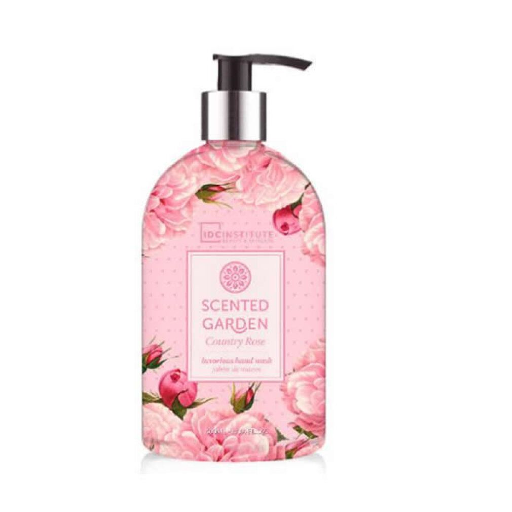 Flacone rosa con motivo floreale di rose e dispenser.