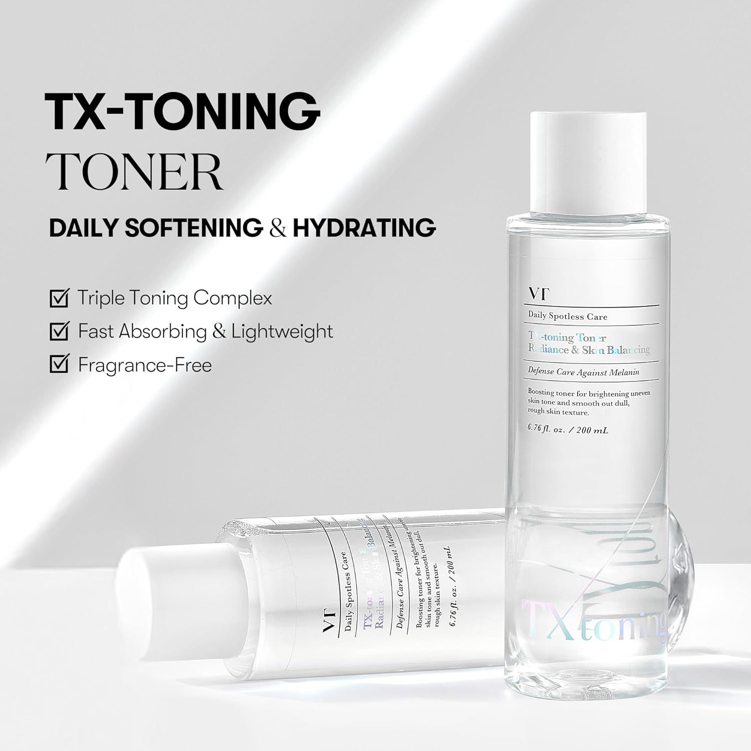 Due flaconi di toner. Uno in piedi, l'altro sdraiato. Scritte: TX-Toning Toner, Daily Softening & Hydrating. Caratteristiche: Triple Toning Complex, Fast Absorbing & Lightweight, Fragrance-Free.