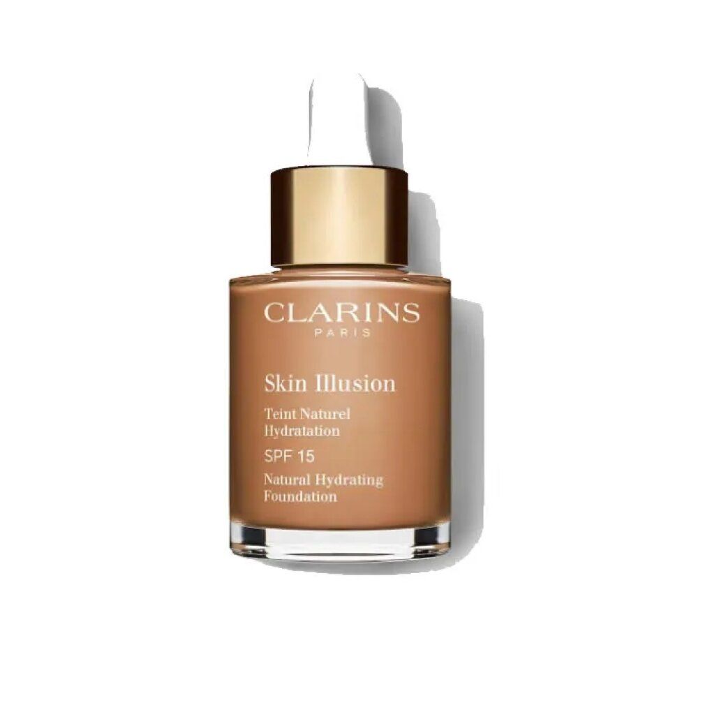 Flacone di fondotinta liquido. Scritta: Skin Illusion, Teint Naturel Hydratation, SPF 15. Marchio: Clarins.