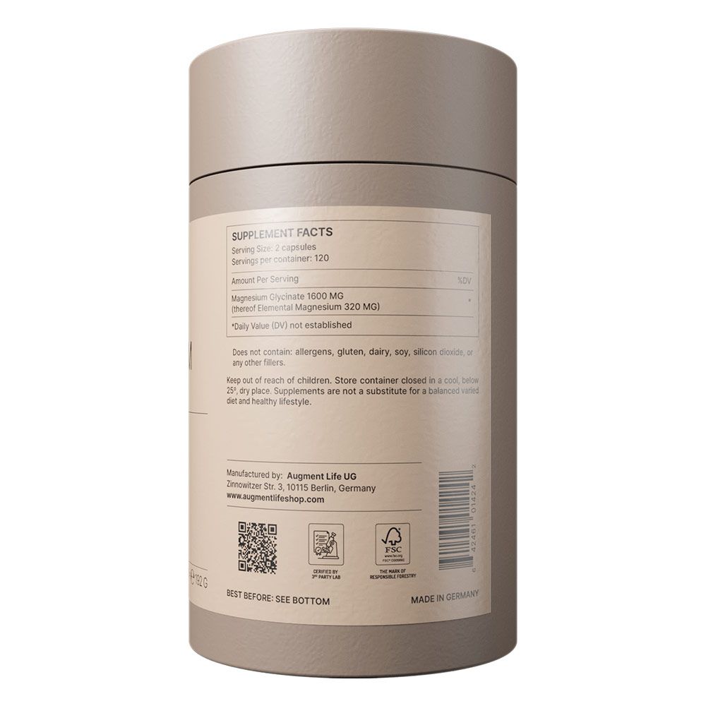 Etichetta con fatti nutrizionali su contenitore cilindrico con dettagli sul magnesio e informazioni sul produttore.