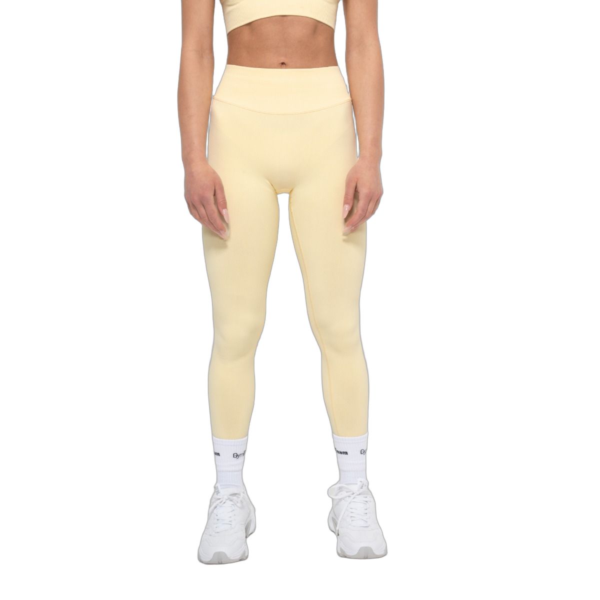 Leggings donna giallo burro, vita alta, vista frontale.