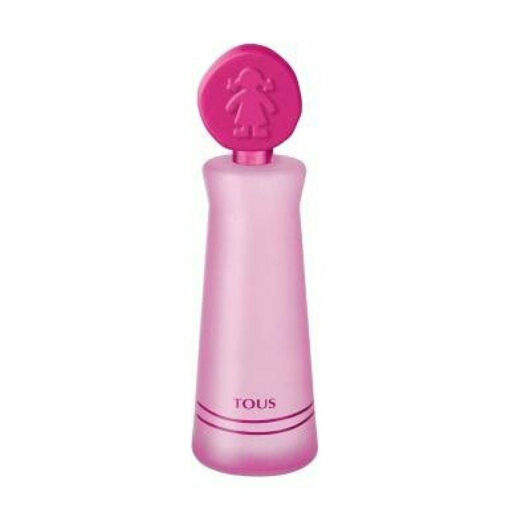 Flacone rosa con tappo rotondo, sagoma di ragazza. Scritta 'TOUS' sul flacone.