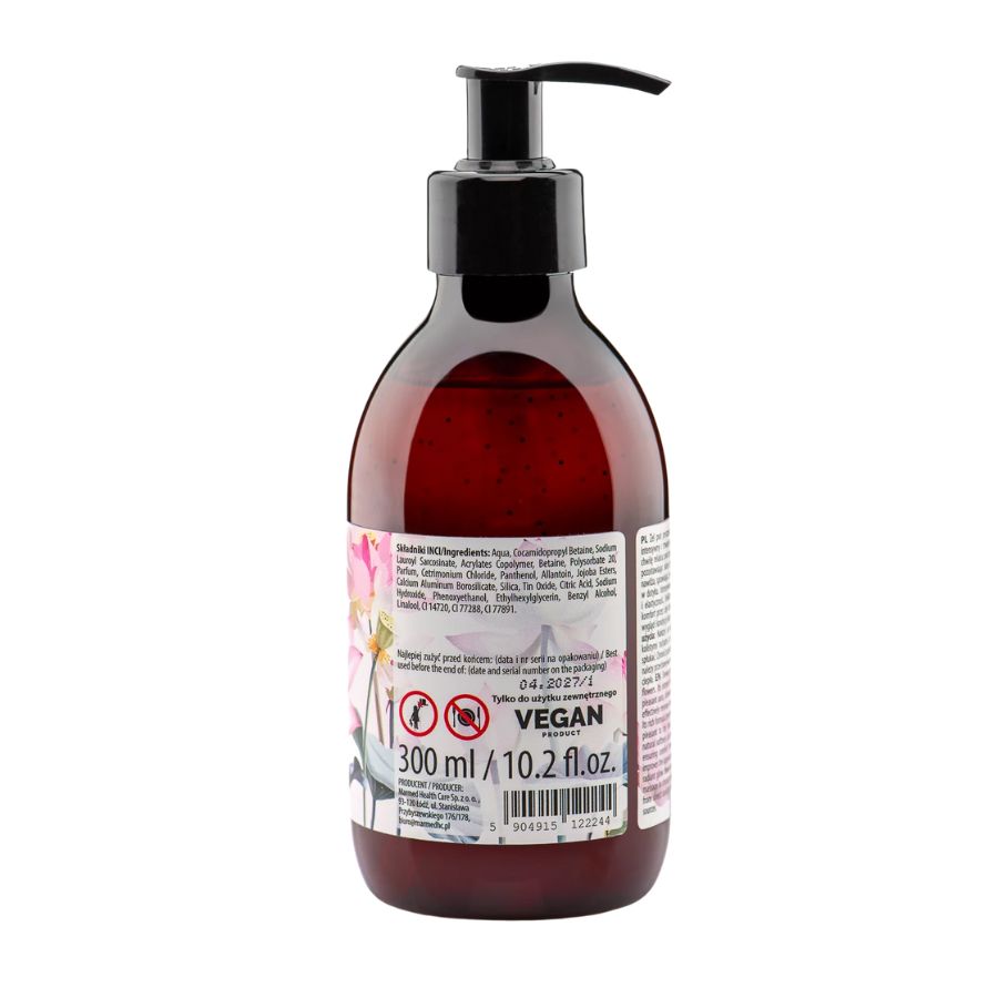 Vista posteriore di un flacone marrone con dosatore nero. Etichetta con ingredienti, avvertenze e logo vegano.