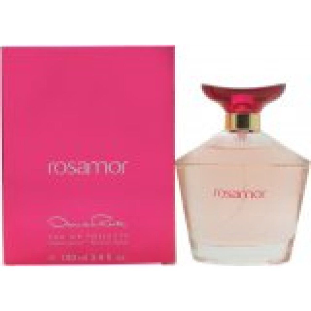 Flacone di profumo e confezione. Flacone con tappo rosso, collo dorato. Confezione rosa con scritta "rosamor".