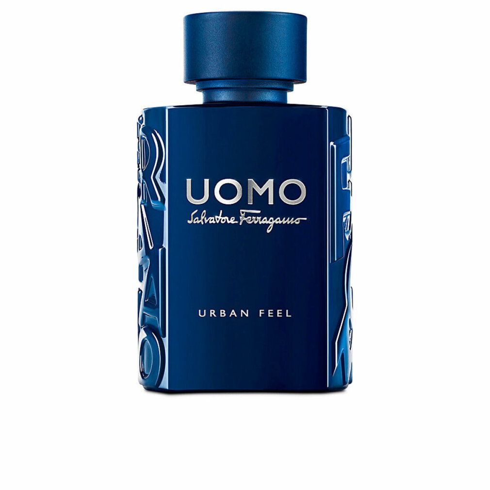 Flacone blu con scritta argento UOMO Salvatore Ferragamo URBAN FEEL. Forma rettangolare, tappo blu.
