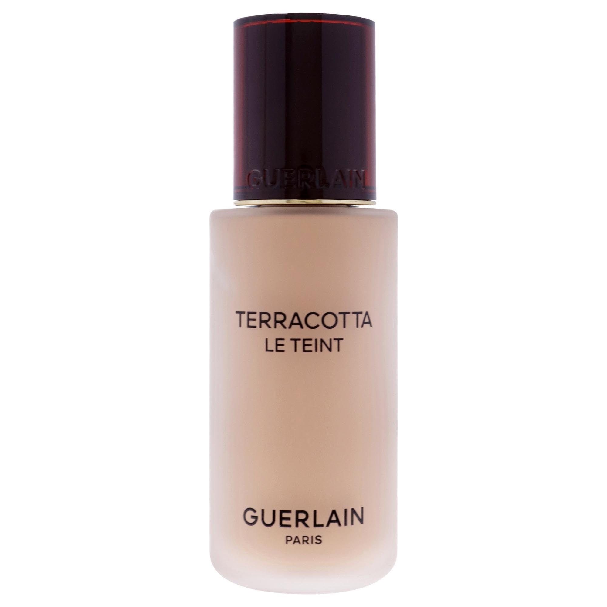 Fondotinta Guerlain Terracotta Le Teint. Flacone con tappo marrone. Testo: Terracotta Le Teint, Guerlain Paris.