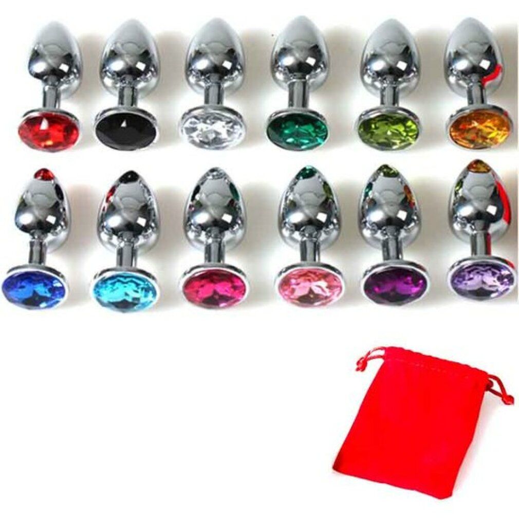 Diversi plug anali di diversi colori. Forma a goccia, argentati. Sacchetto rosso.