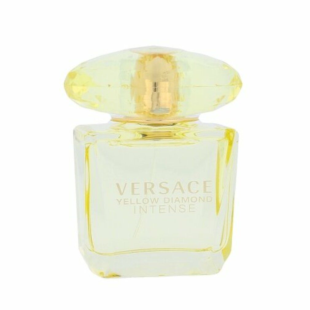 Flacone giallo con tappo giallo. Scritta: VERSACE YELLOW DIAMOND INTENSE. Forma quadrata. Contenitore trasparente.