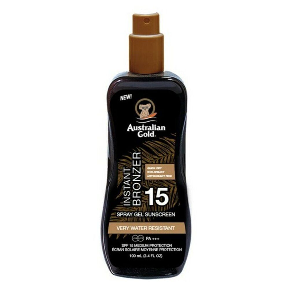 Flacone nero di spray solare. Scritte: Australian Gold, Instant Bronzer, SPF 15, molto resistente all'acqua. Con erogatore.