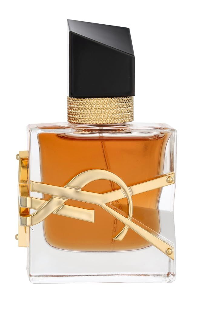 Flacone di profumo con logo dorato e tappo nero. Flacone quadrato in vetro con liquido ambrato.