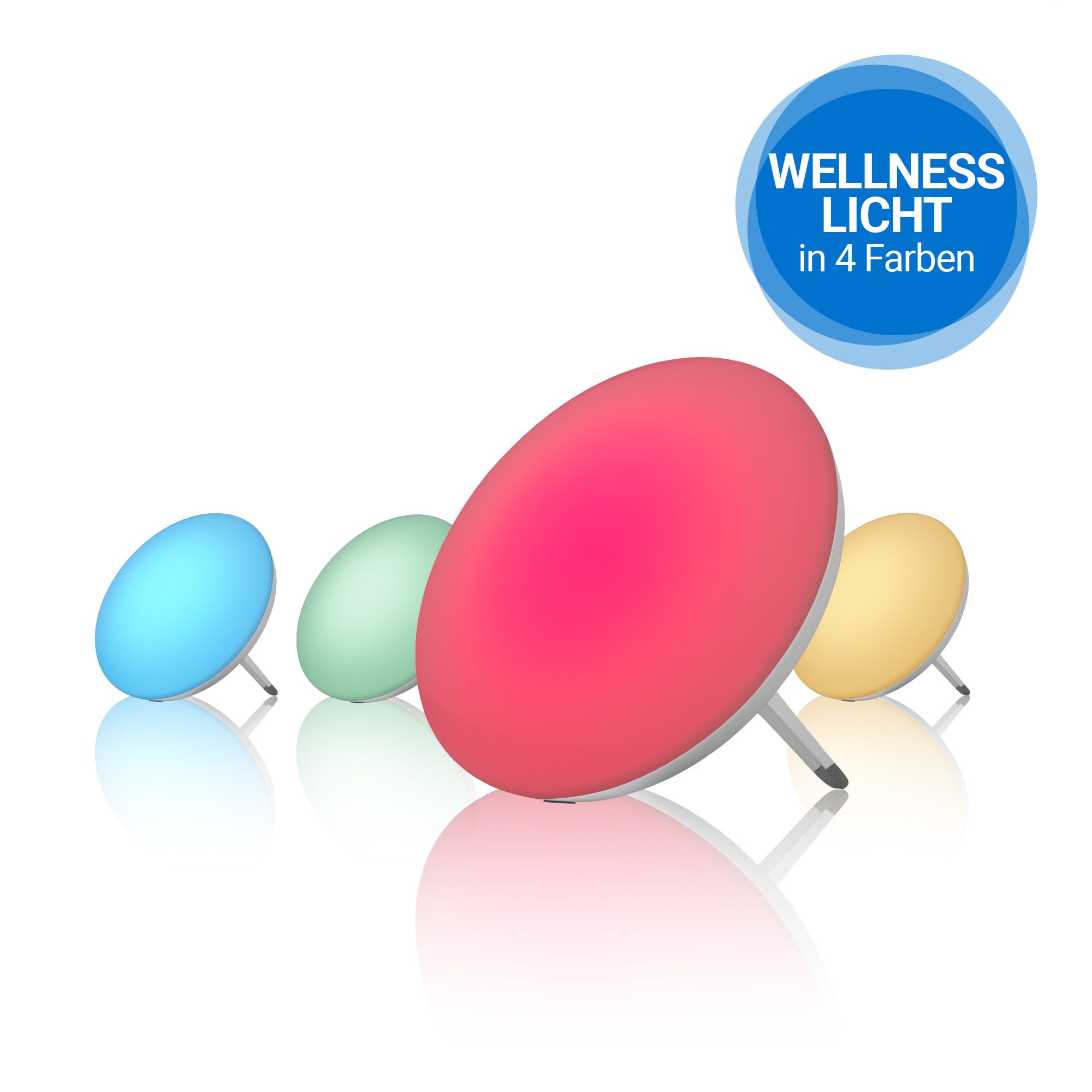 Quattro lampade per la luce diurna in diversi colori (blu, verde, rosa, giallo) su un tavolo.