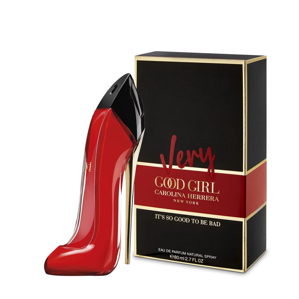 Flacone rosso a forma di tacco alto e confezione. Tappo nero, suola dorata. Scritta: Very Good Girl, Carolina Herrera.