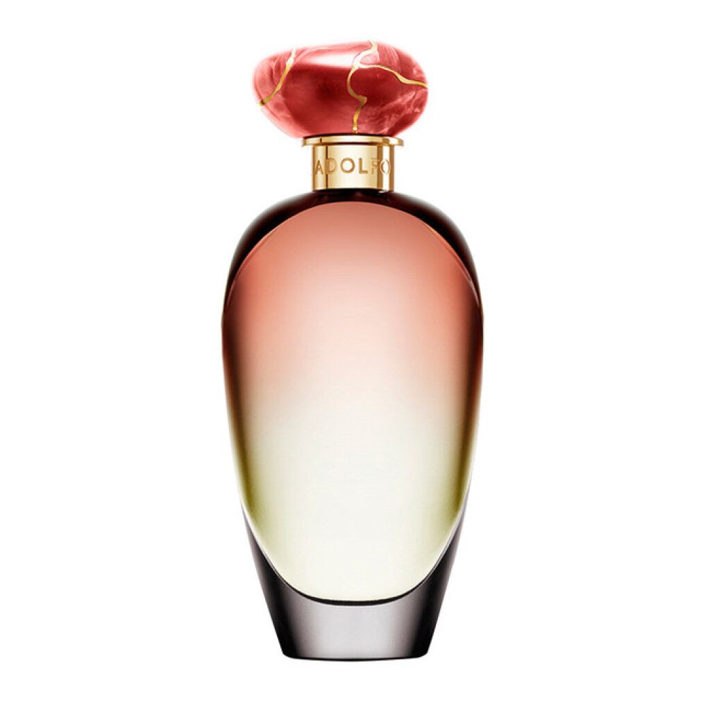 Flacone di profumo con sfumatura rosa-giallo. Tappo rosso. Collo dorato.