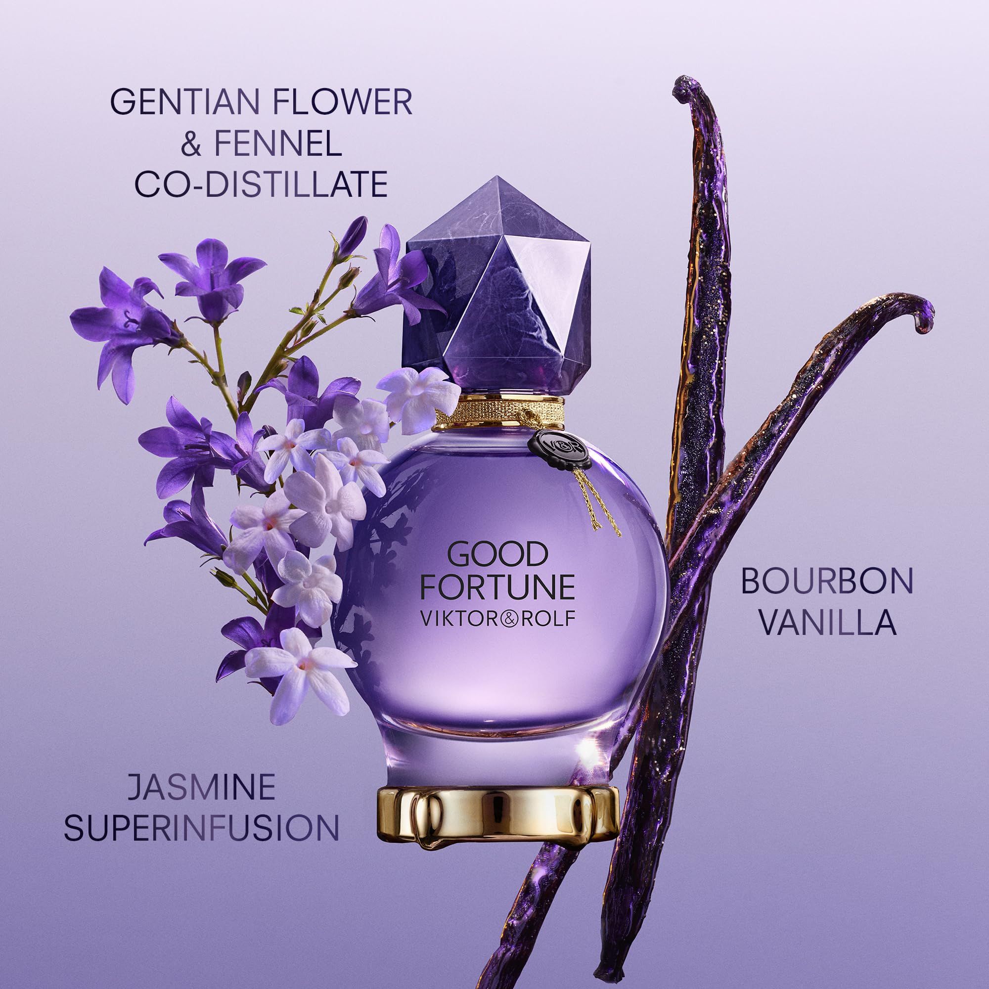 Flacone viola con tappo di cristallo. Accanto: gelsomino, vaniglia, fiori. Scritta: Good Fortune, Viktor & Rolf.
