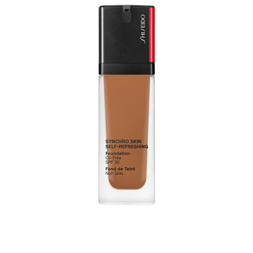 Fondotinta liquido in bottiglia di vetro. Tappo nero con accento rosso. Scritta: Synchro Skin Self-Refreshing Foundation, SPF 30.