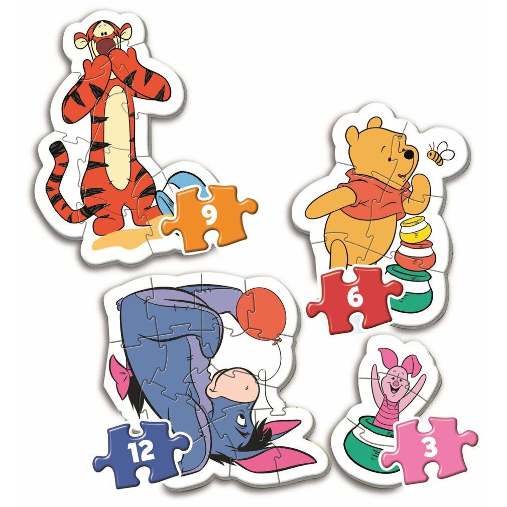 Quattro pezzi di puzzle con Winnie, Tigro, Pimpi e Ih-Oh. I pezzi sono di forme e colori diversi.