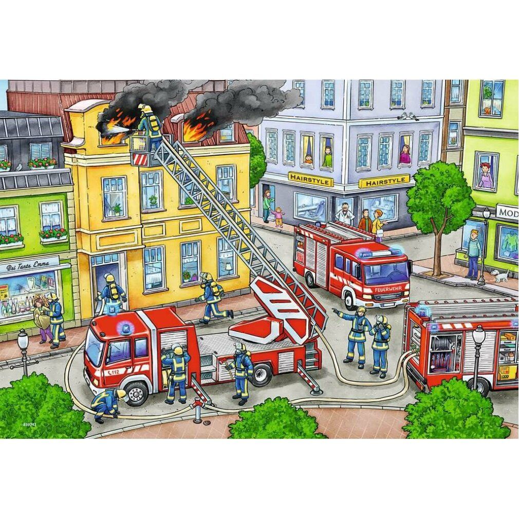 Pz. Mit Blaulicht unterwegs 2x12T. Immagine puzzle di una scena dei vigili del fuoco con autopompe e pompieri.