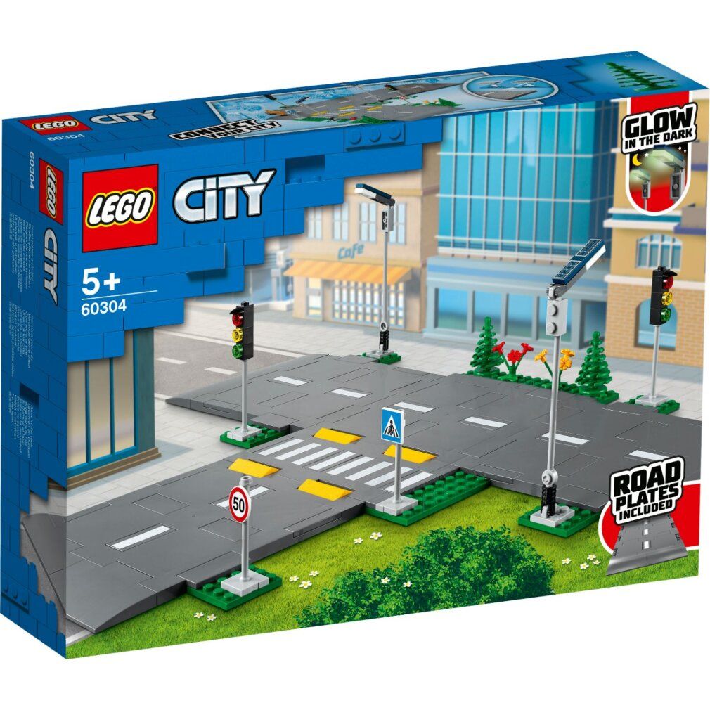 Set di piattaforme stradali LEGO City. Include piattaforme, semafori, segnali stradali e edifici. Confezione con logo.