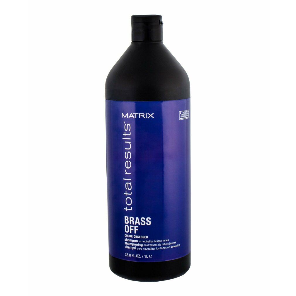 Flacone di shampoo blu con tappo nero. Scritta: Matrix Total Results Brass Off. 1L.
