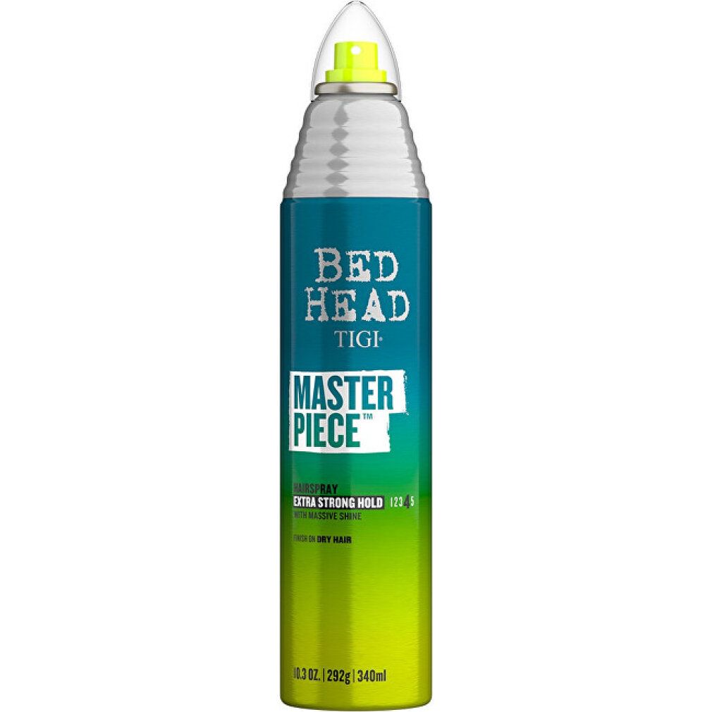 Tigi Bed Head Masterpiece spray per capelli. Bomboletta blu e verde, erogatore argentato. Testo: Masterpiece, Extra Strong Hold. 10.3 oz/292g/340ml.