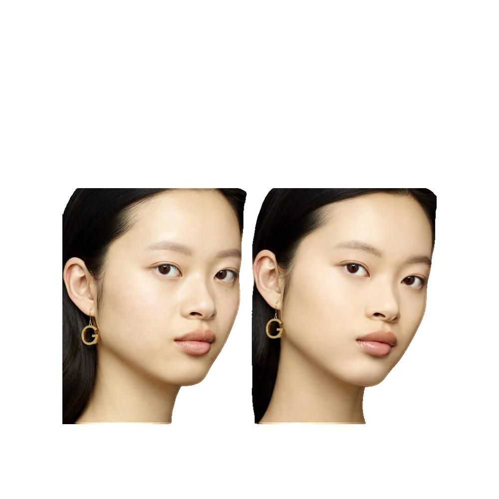 Due volti, non truccato a sinistra, truccato a destra. Entrambi indossano orecchini con 'G'.