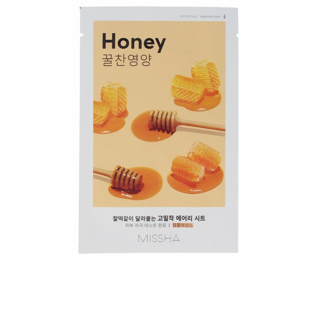 Maschera viso al miele. Confezione con motivi a nido d'ape e cucchiai di miele. Scritta "Honey" e "MISSHA".