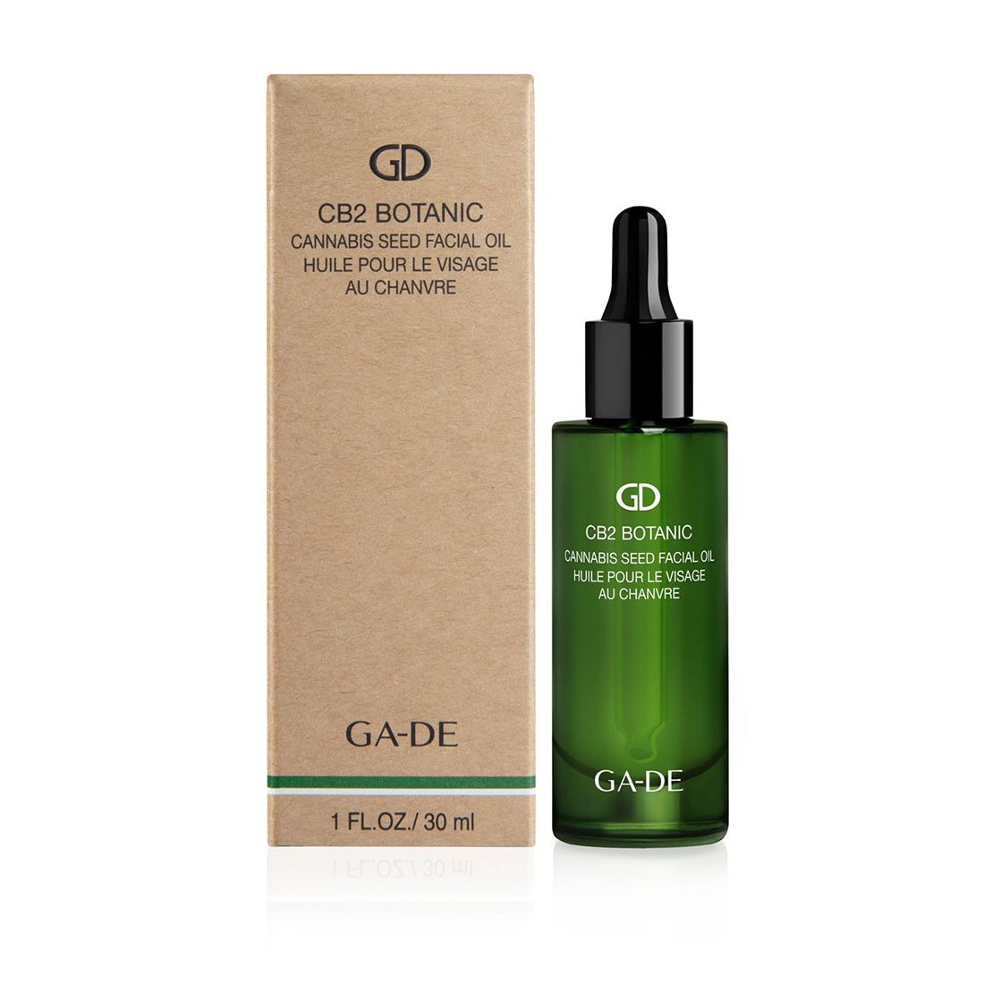 Flacone di vetro verde con contagocce nero e scatola. Scritta: CB2 Botanic Cannabis Seed Facial Oil. Marchio: GA-DE.