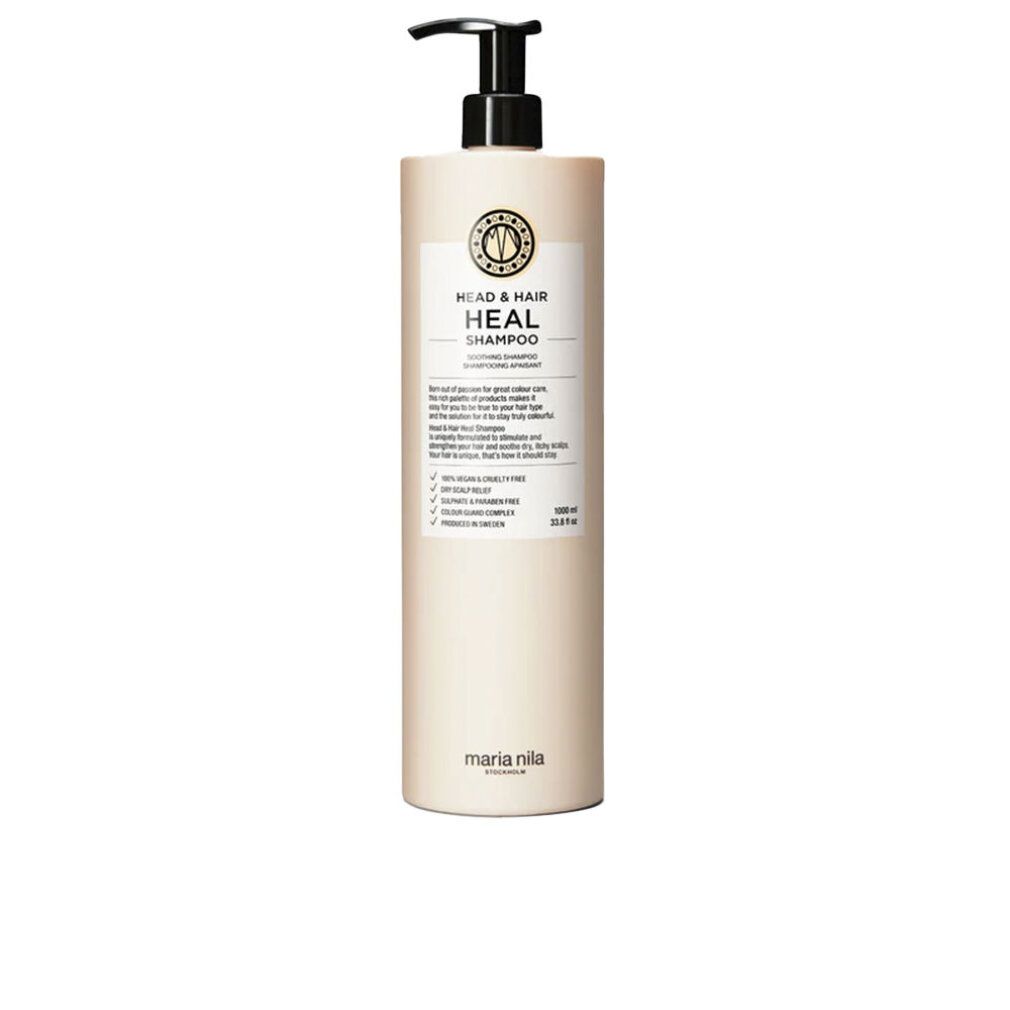 Flacone di shampoo beige con dosatore nero. Scritta: HEAD & HAIR HEAL SHAMPOO. Marchio: Maria Nila.