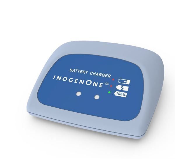 Caricatore Inogen One G5 con indicatori di carica e logo Inogen One.