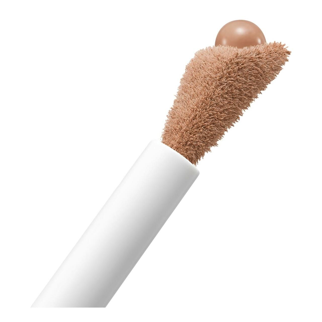 Applicatore con correttore. L'applicatore ha una punta rotonda e un applicatore marrone e soffice.