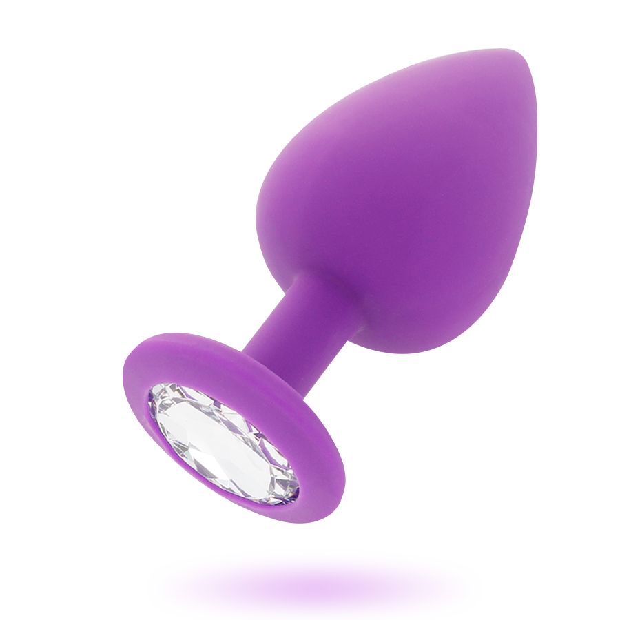 Plug anale viola in silicone con cristallo sulla flangia, presentato in sospensione.