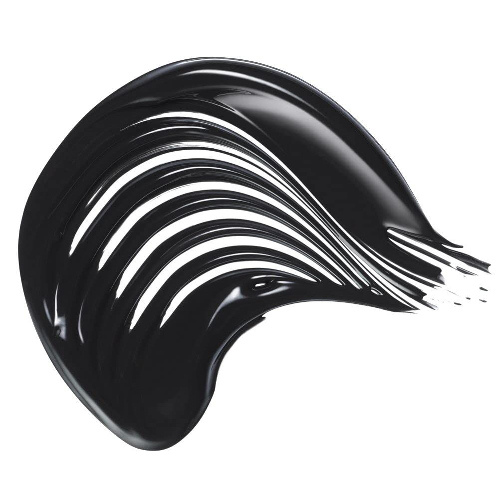 Tratto di mascara nero su sfondo bianco. Texture lucida.