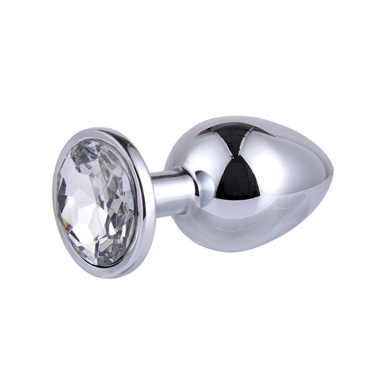 Plug anale in metallo con dettaglio in cristallo. Superficie lucida, base rotonda con cristalli.
