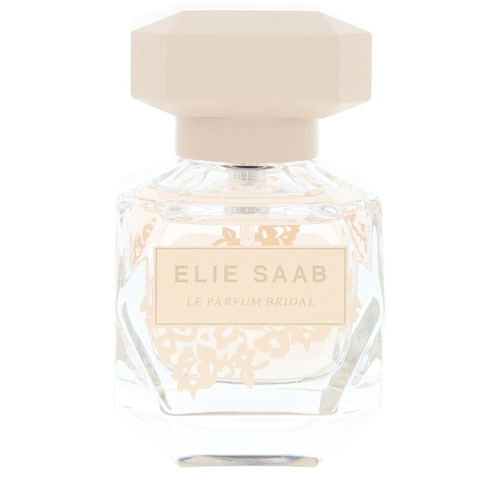 Flacone Elie Saab Le Parfum Bridal. Flacone trasparente con tappo beige e motivo floreale. Testo: Elie Saab Le Parfum Bridal.