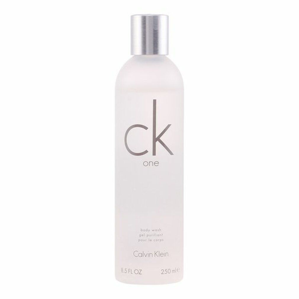 Flacone di bagnoschiuma con tappo argentato. Scritta "ck one" e "Calvin Klein".