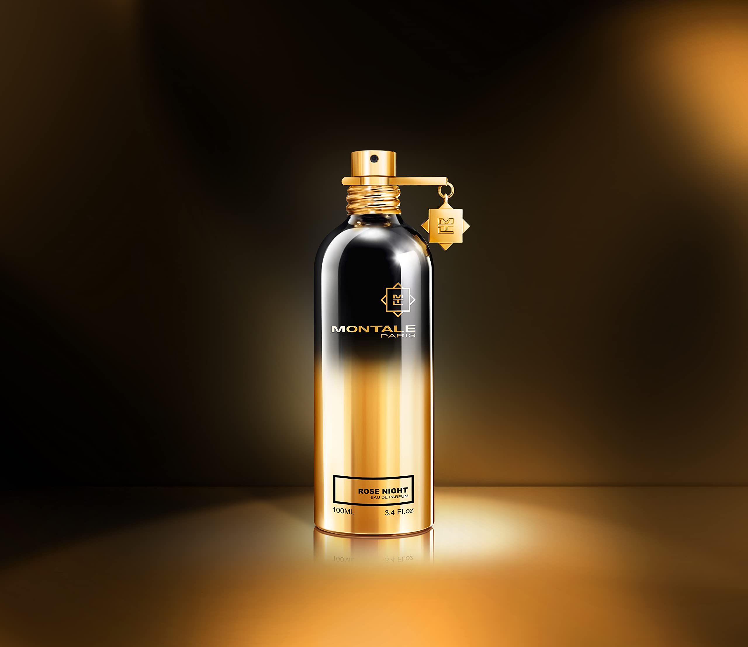 Flacone di profumo sfumato oro e nero. Dettagli dorati, tappo nero. Scritta: Montale Paris, Rose Night.