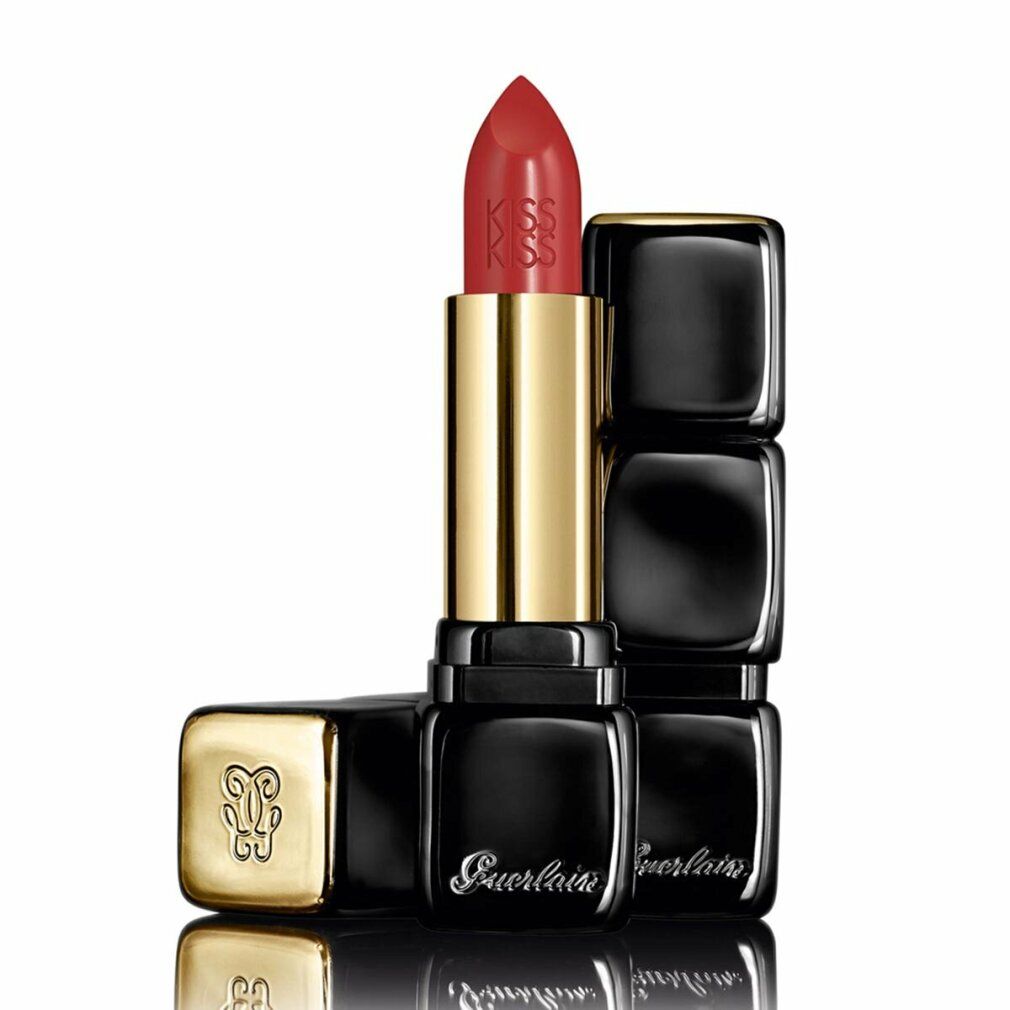 Rossetto rosso in custodia nera quadrata. Stelo dorato. Visibili "Kiss Kiss" e "Guerlain".