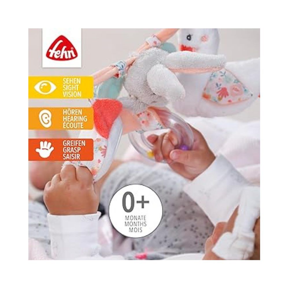 Bambino con catena gioco. Coniglio, anatra, specchio e sonaglio. Marchio Fehn. Età: 0+ mesi.