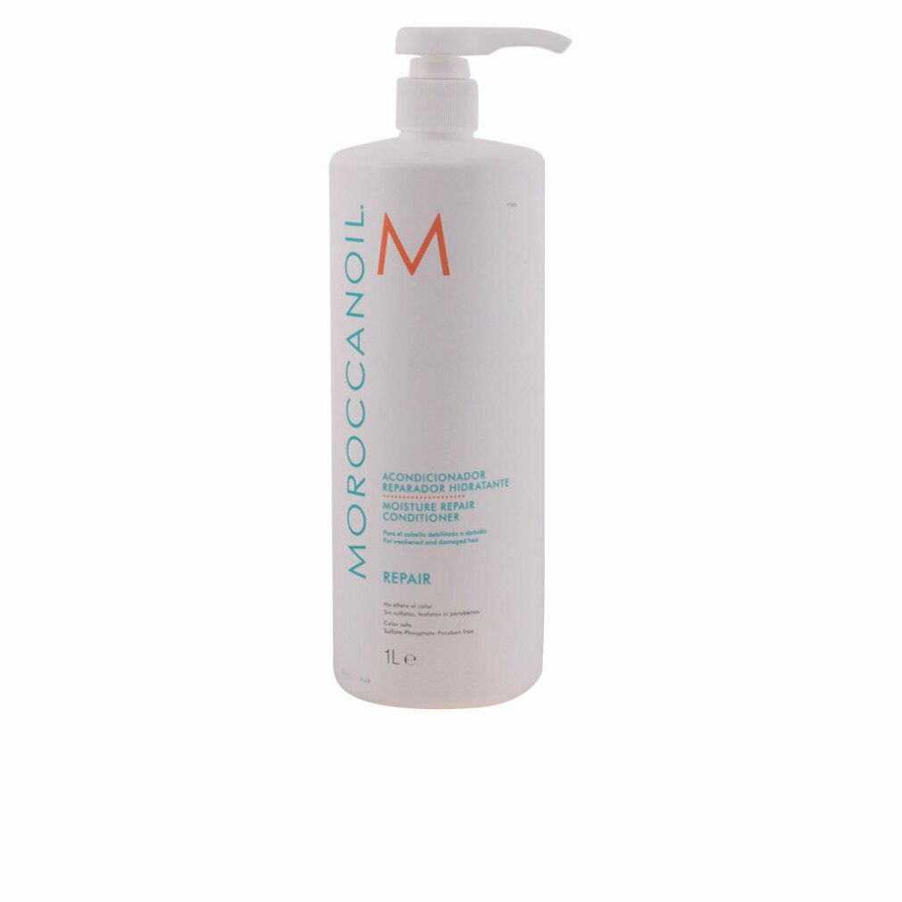 Flacone bianco con dosatore. Scritta: Moroccanoil, logo M, Conditioner, Repair. Testo in spagnolo. Adesivo arancione.
