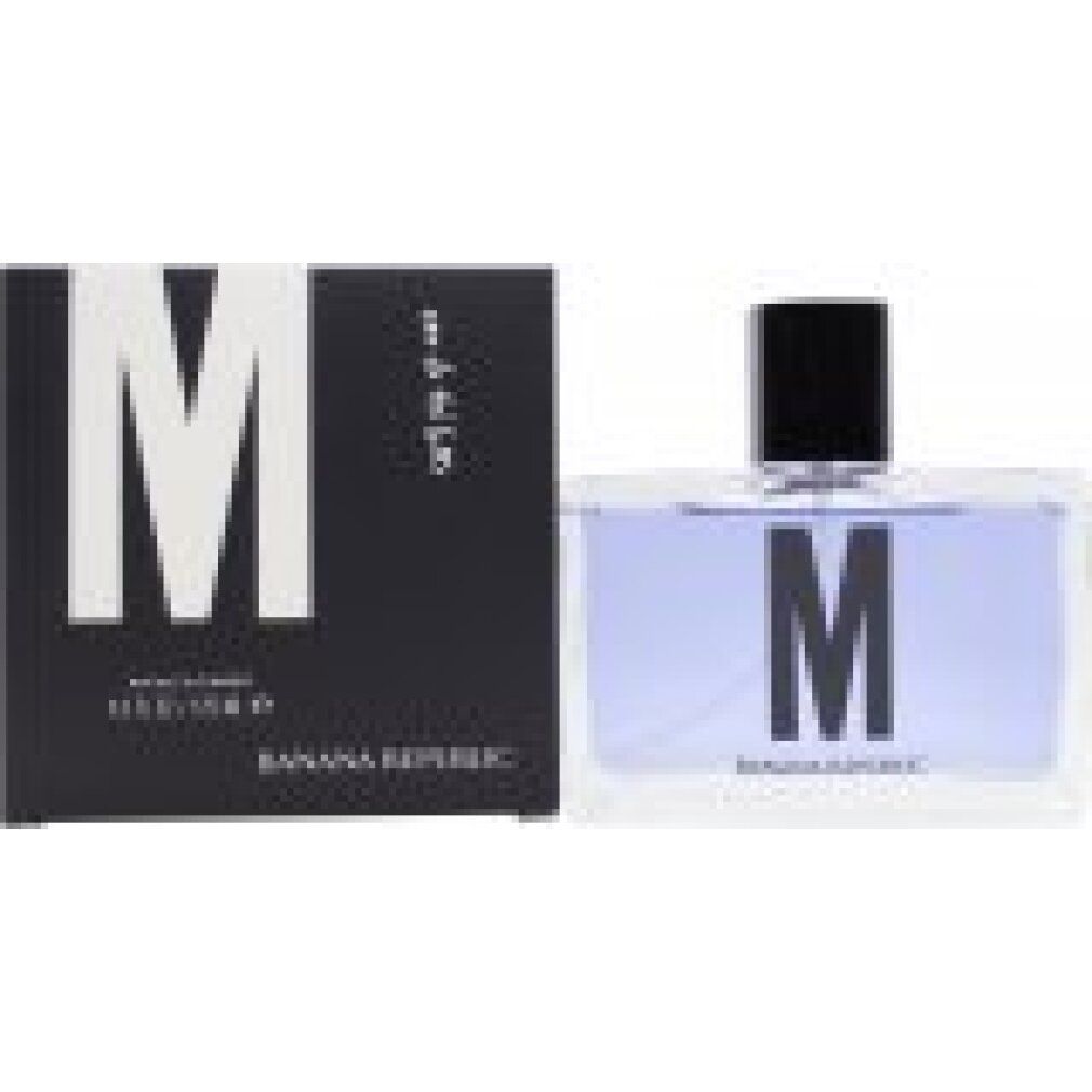 Flacone e scatola Eau de Toilette. Scatola nera con "M" bianco. Flacone con tappo nero e "M".