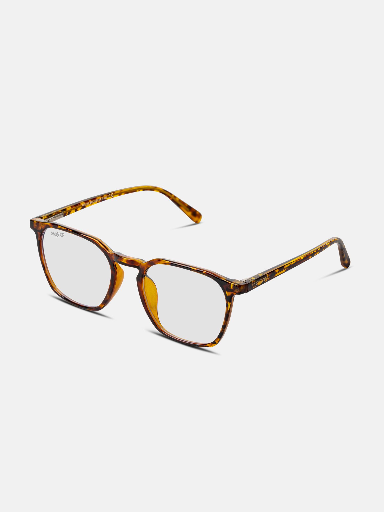 Occhiali unisex con montatura tartarugata. Lenti quadrate. Aste con logo.